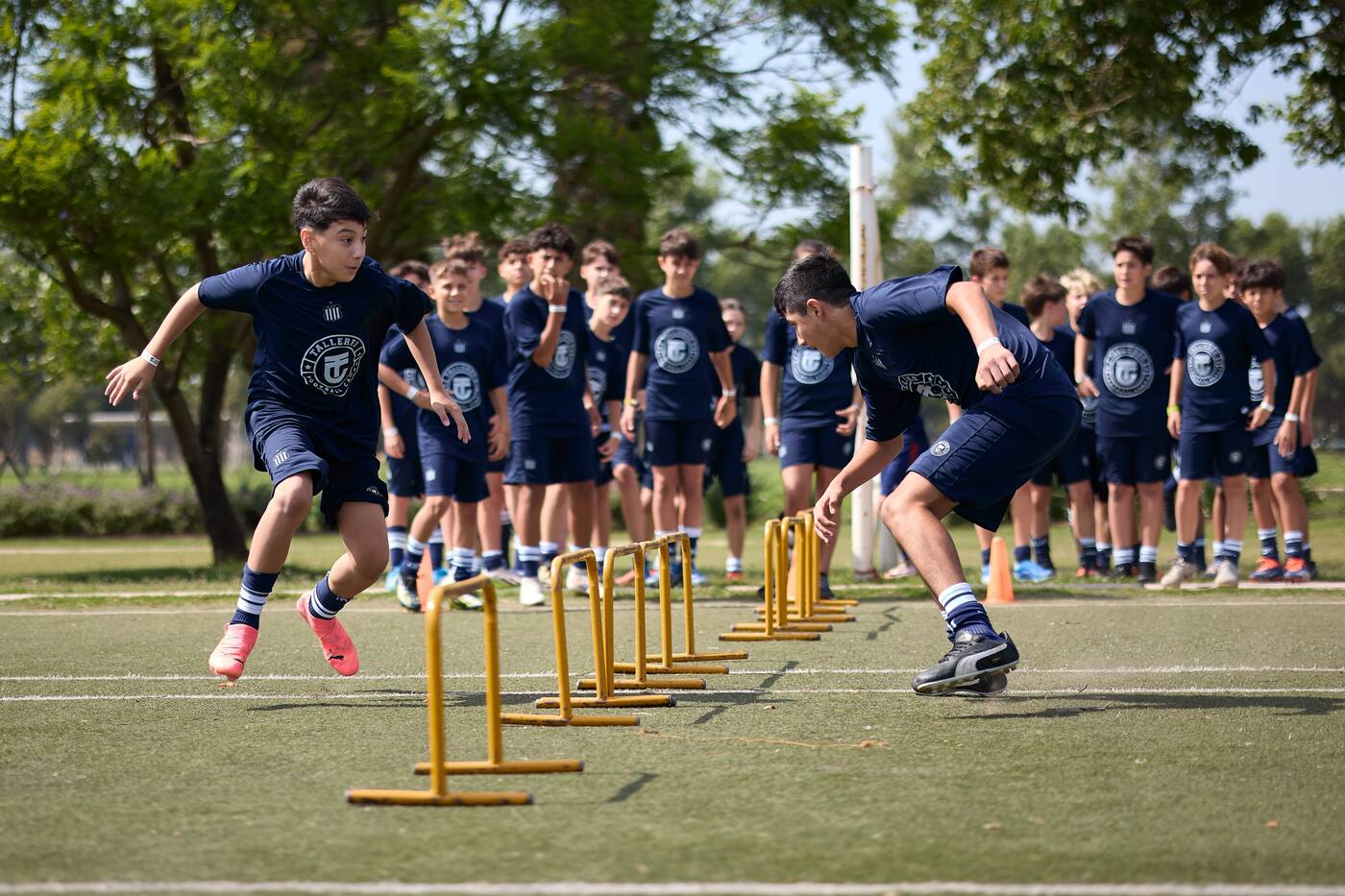 Players training together on the soccer pitch in Argentina